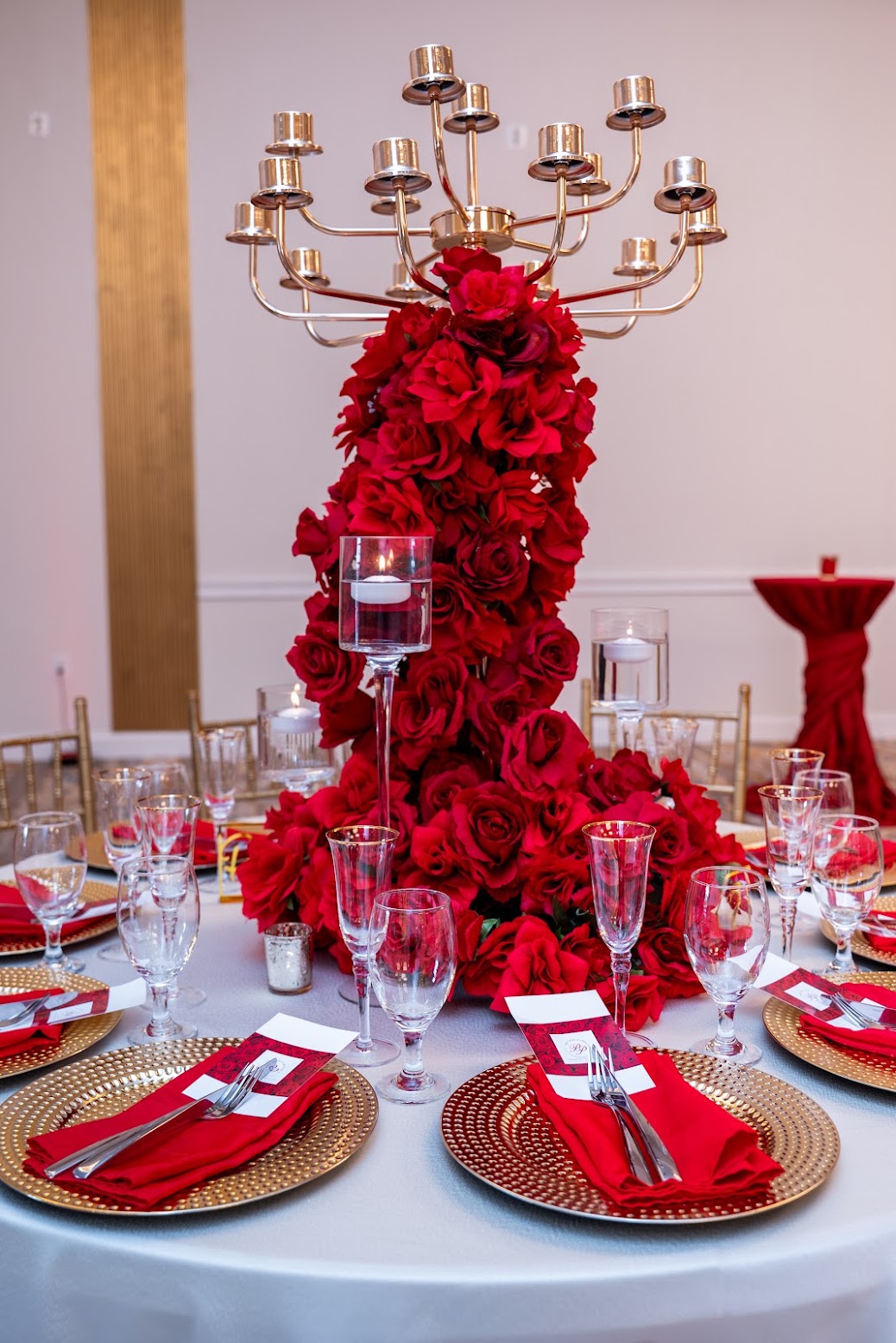 Red rose centerpiece with candelabra